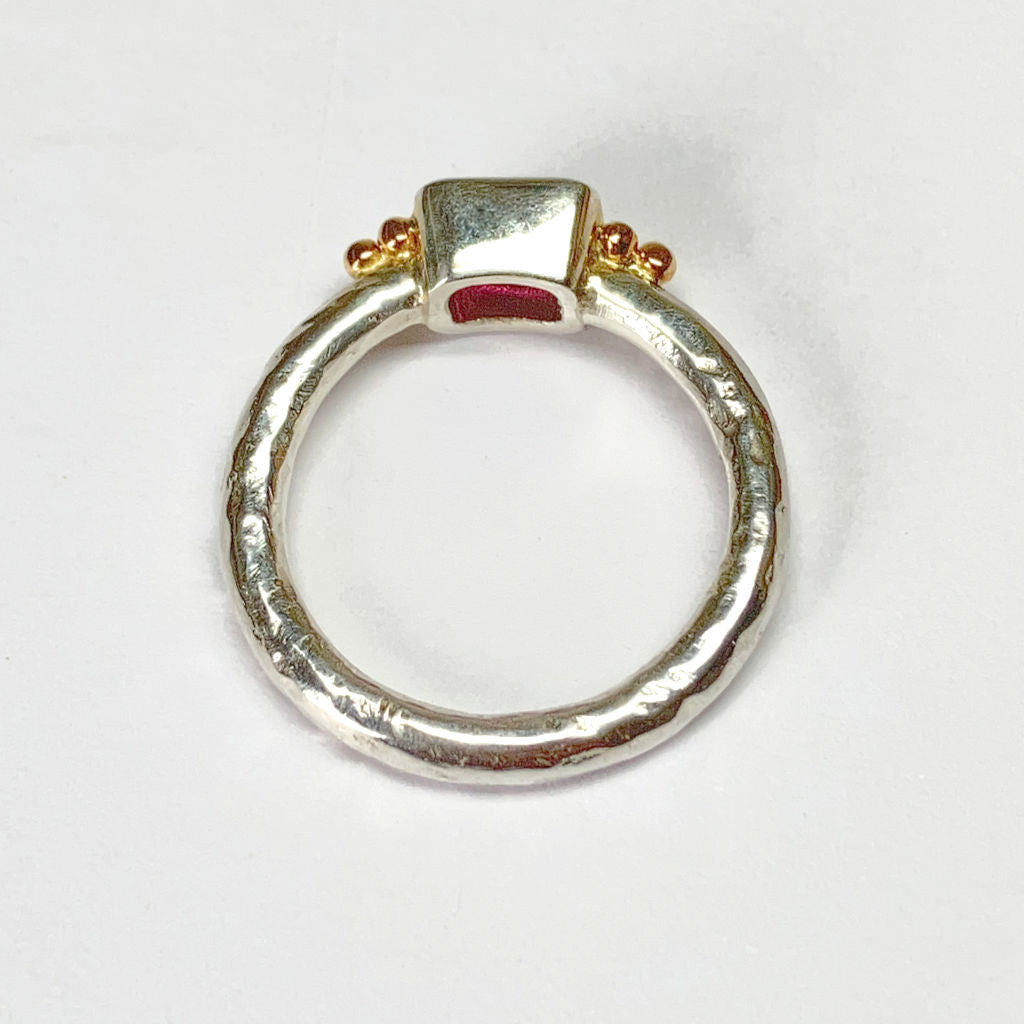 Silver ring with gold granules an pink tourmaline on a white background Amanda Cox for Heart Gallery