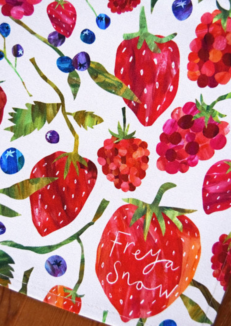 Tea Towel with illustration of strawberries and raspberries by 'Freya Snow'.