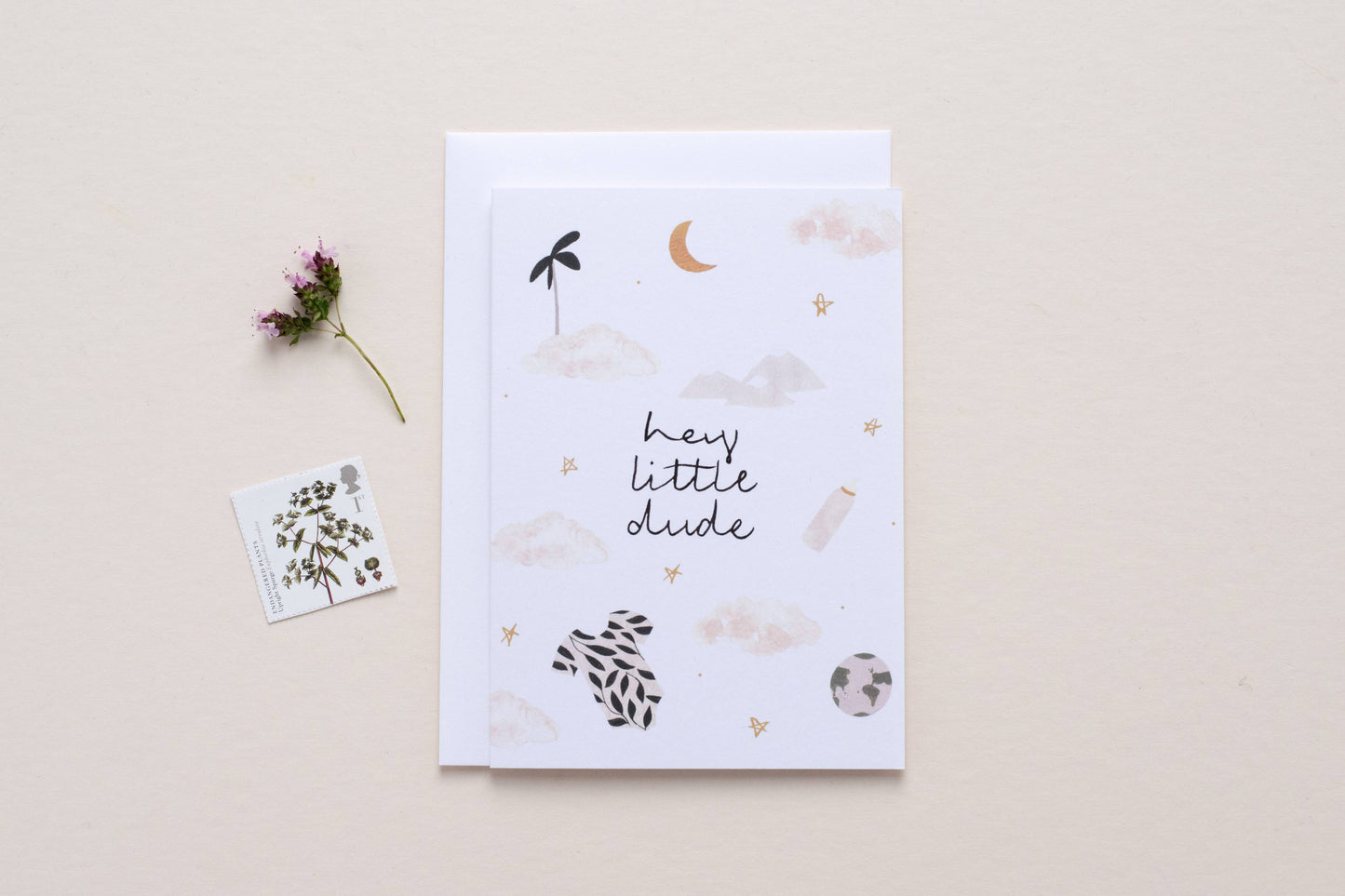 Greeting card with decorative elements and text on a beige background Hey Little Dude