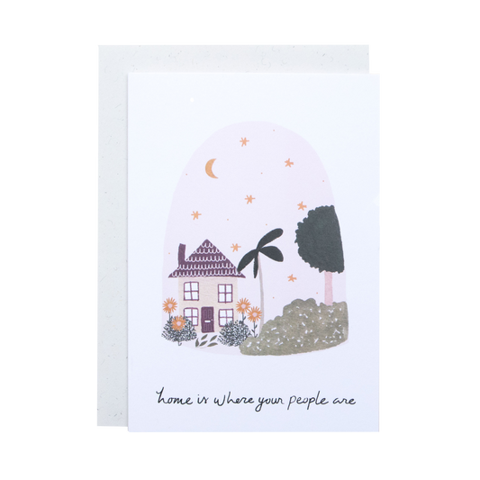 Illustration of a house with plants and text 'home is where your people are' on a white background