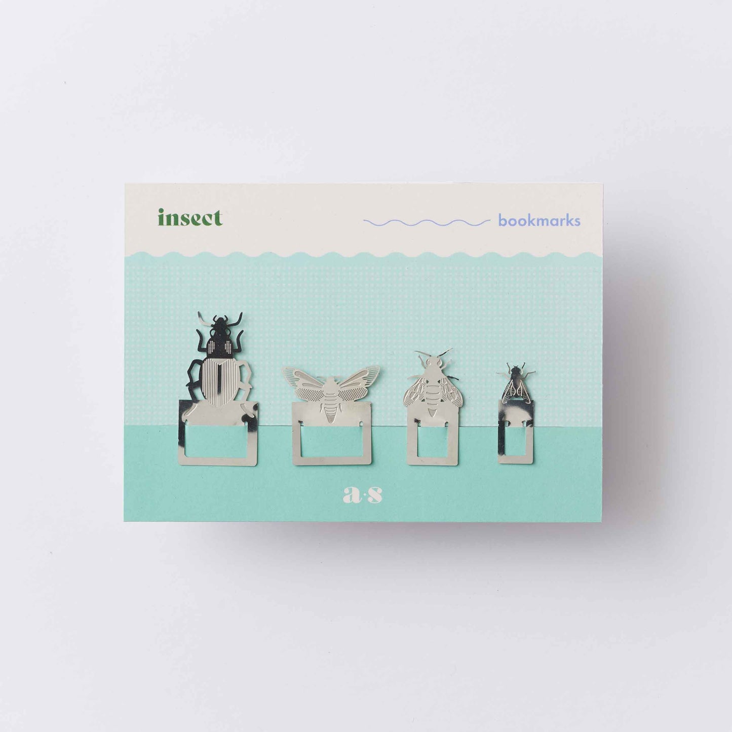 A set of metal page markers in the shapes of insects such as a moth and fly packaged ready for posting