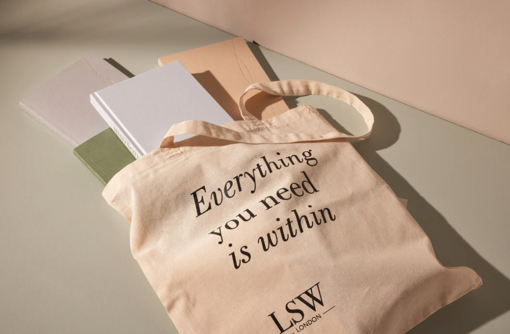 Beige tote bag with 'Everything you need is within' text and LSW London logo, shopping bag