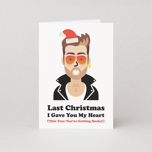 Card with a stylised illustration of a person wearing a Santa hat and sunglasses, with text on a white background.