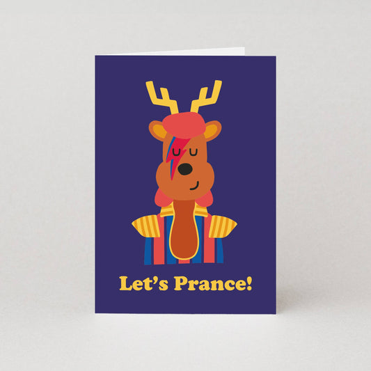 Card with a cartoon reindeer wearing a hat and scarf, and the text 'Let's Prance!' on a purple background.
