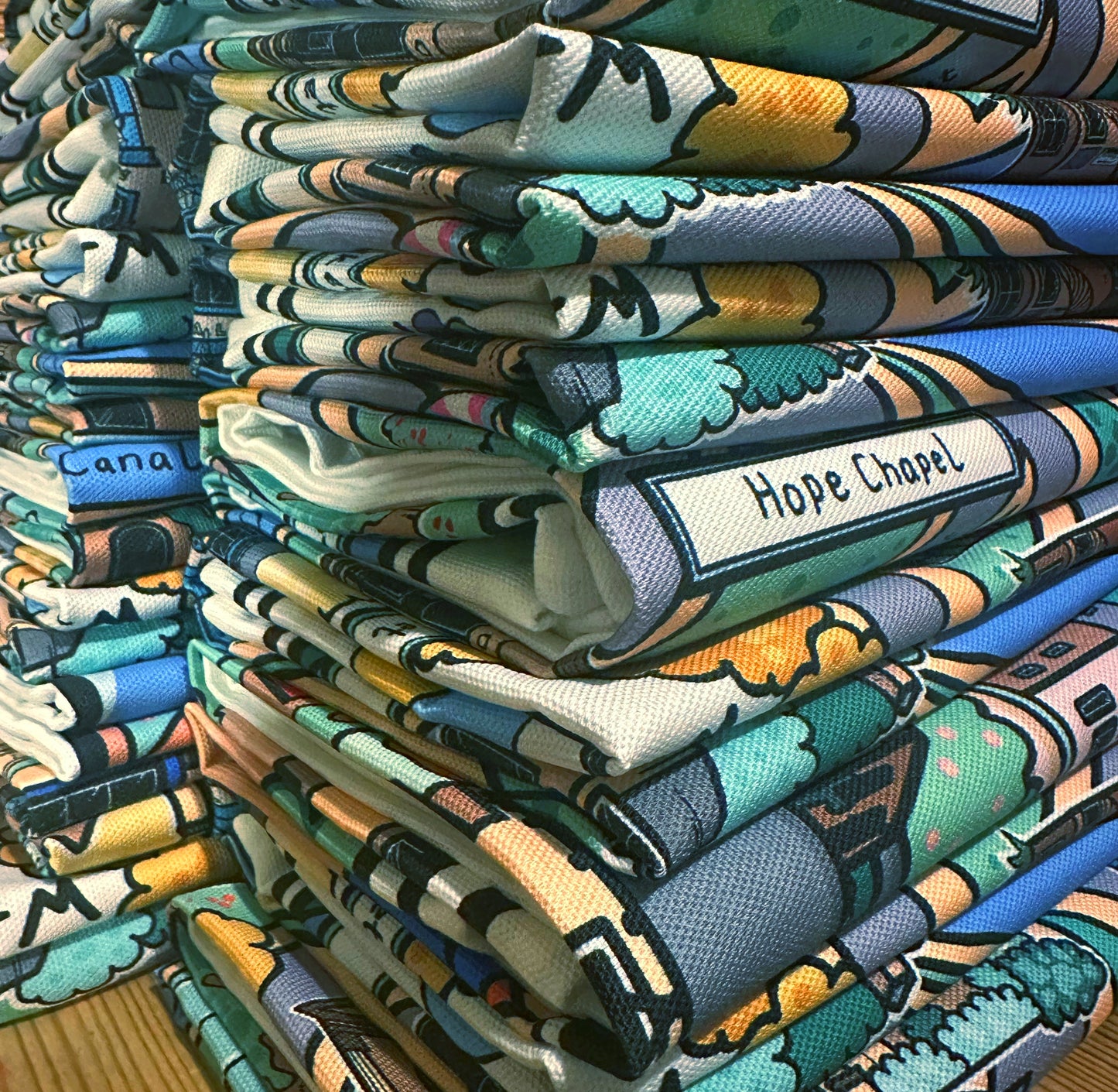 Pile of Tea Towels by Lucy Parker