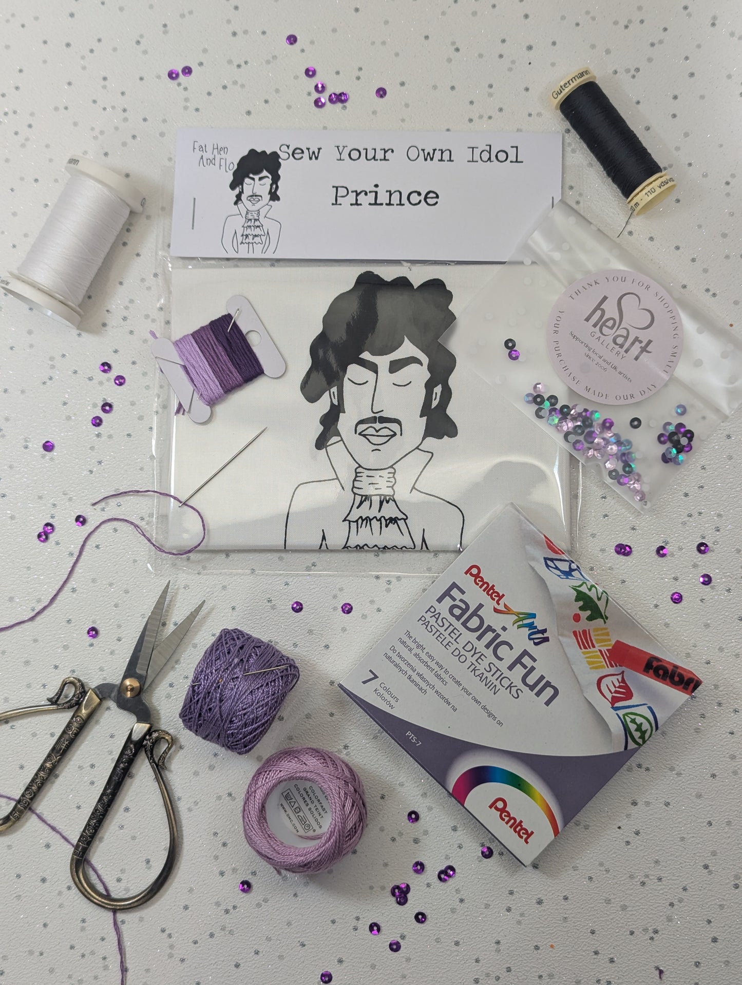 Crafting kit with sewing supplies and a Sew Your Own idol - Prince - with pruple thread and sequins