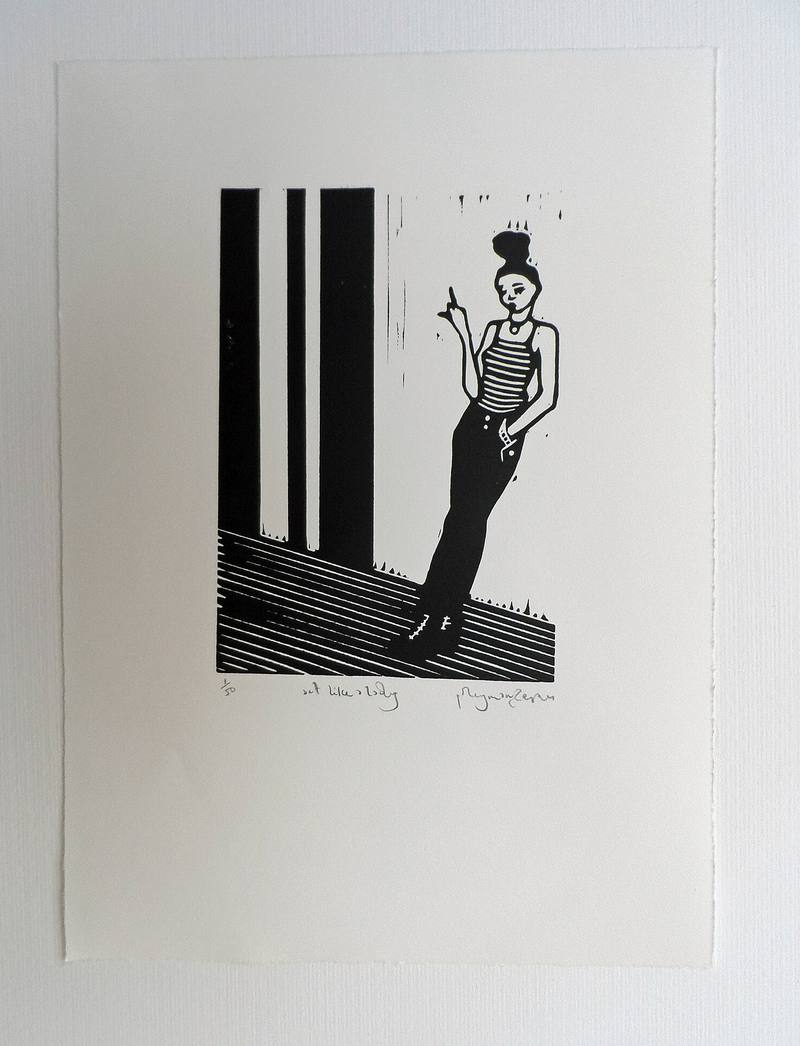 A black and white linocut artwork of a female figure  with a bun standing on one foot, with a pointing finger, titled and signed by Polly Marix-Evans.
