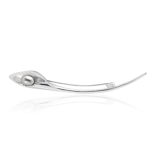 A silver brooch that looks like a cala lilly with a freshwater pearl, handmade jewellery made in Yorkshire, Amanda Cox,Hebden Bridge