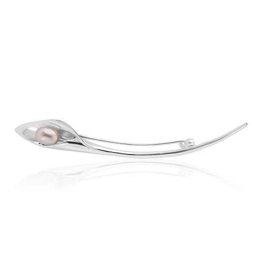 A silver brooch that looks like a cala lilly with a freshwater pearl, handmade jewellery made in Yorkshire, Amanda Cox,Hebden Bridge