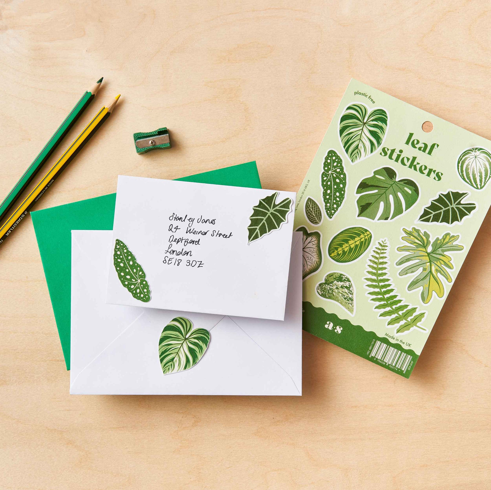A sheet of various hand-drawn leaf stickers with a matte finish, designed by Another Studio, suitable for decorating surfaces such as notebooks and mirrors.