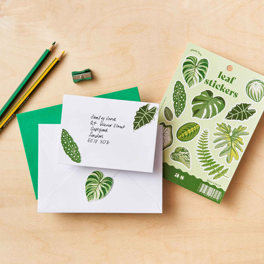 A sheet of various hand-drawn leaf stickers with a matte finish, designed by Another Studio, suitable for decorating surfaces such as notebooks and mirrors.