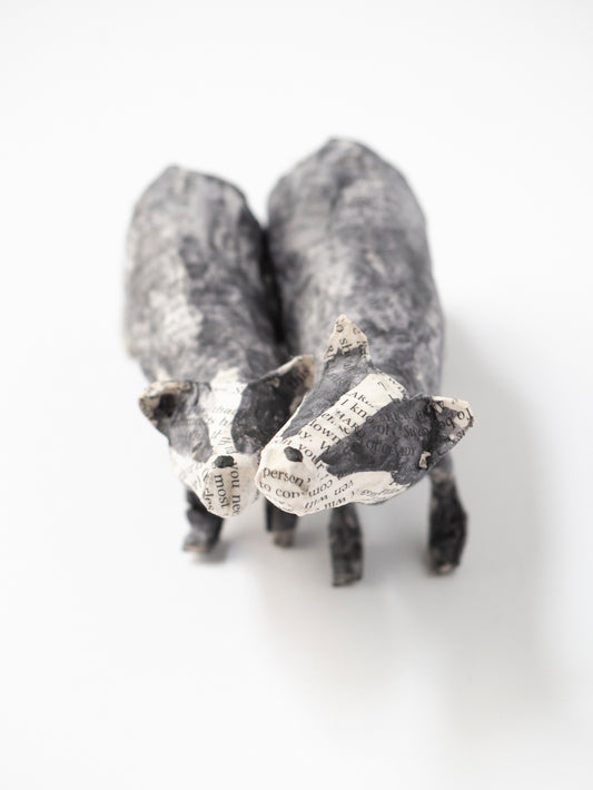 Paper mache badger figurine on a white background by Diana Parkhouse for Heart Gallery