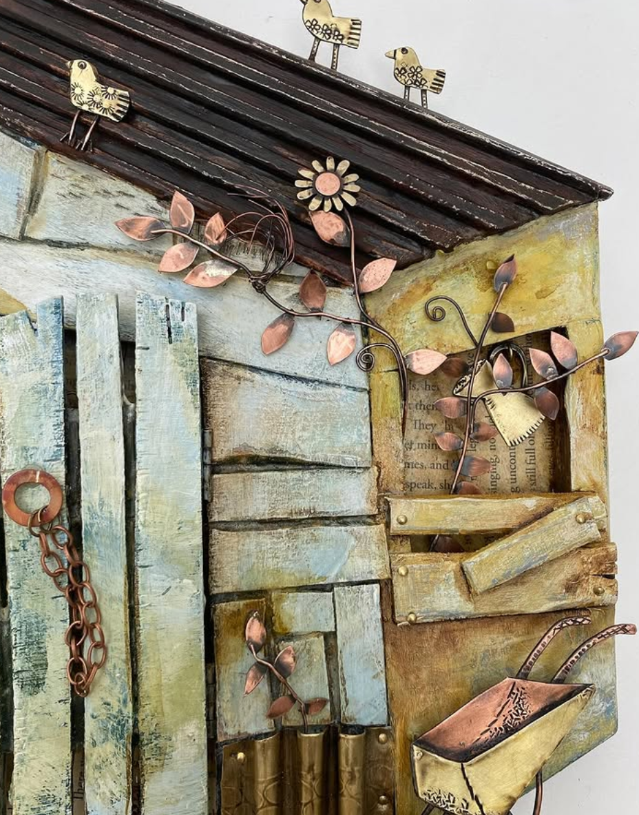 Decorative wall art with rustic elements, including metal birds, flowers, and a wheelbarrow by Fraces Noon