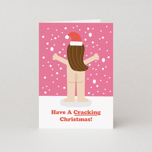Card with a cartoon character wearing a Santa hat on a pink background with snowflakes, and text 'Have A Cracking Christmas!'.
