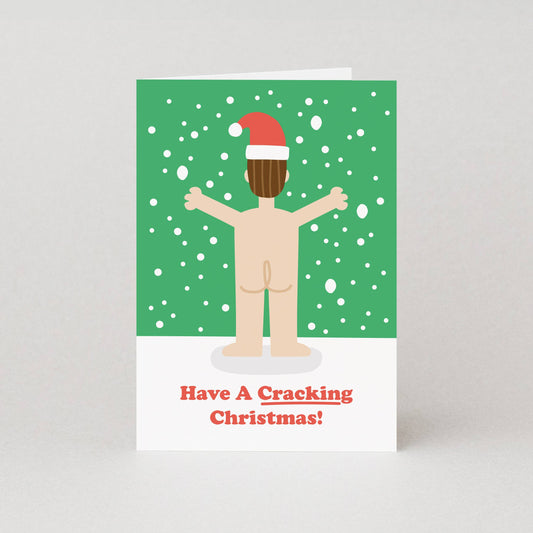 Christmas card with a cartoon character wearing a Santa hat on a green background with snowflakes.