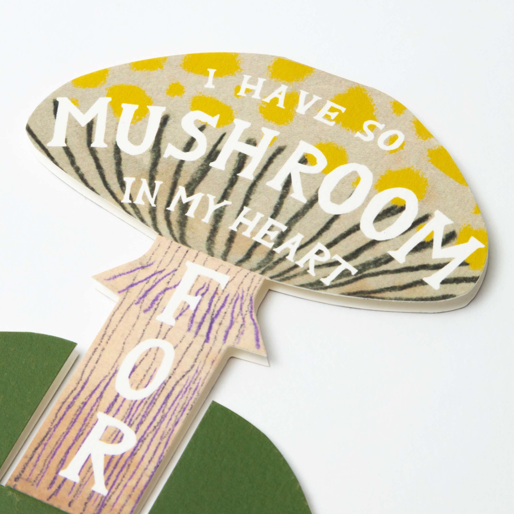 Mushroom-shaped card with text on a white background