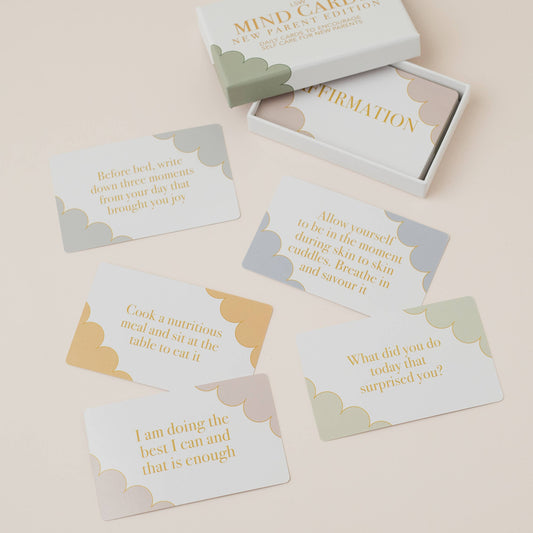 Set of cards with motivational phrases in a box on a beige background by LSW Mind Cards
