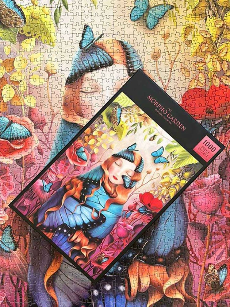 Morpho Garden puzzle box with a colorful design of a woman surrounded by butterflies and flowers.