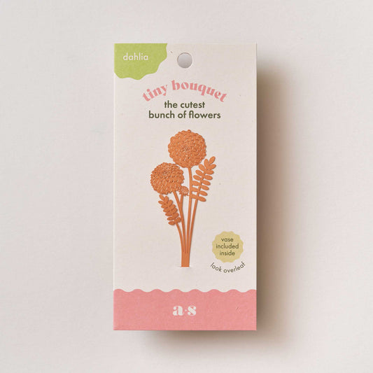 Packaged tiny bouquet by Another Studio of a Dahlia