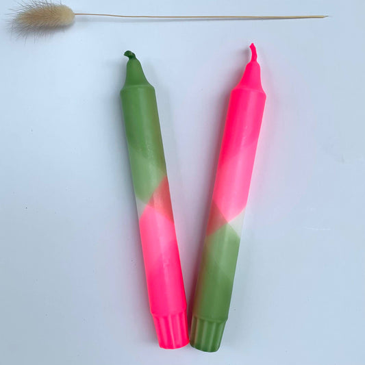 Two gradient candles, one green to pink and the other pink to green, on a white background by The Singing Rabbit