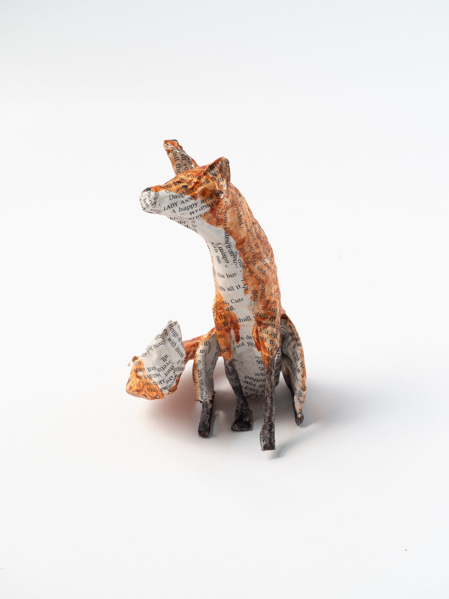 Paper mache fox sculpture on a white background by Diana Parkhouse for Heart Gallery